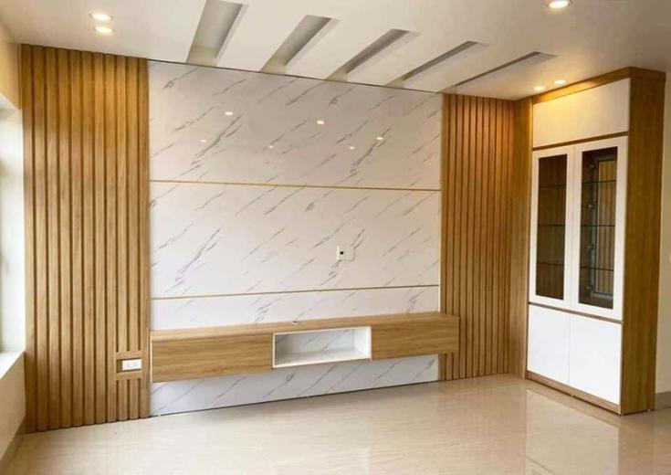 Các mẫu vách tivi phòng khách đẹp tại Lê Gia Interiors